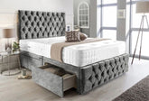 Gray tufted bed with storage drawers in a modern bedroom setting